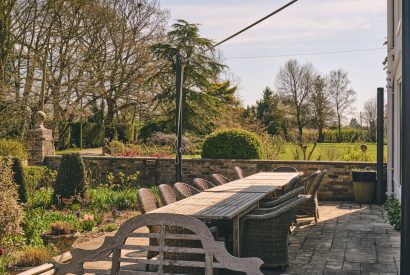 Outdoor dining area at Hockham House, Norfolk Coast