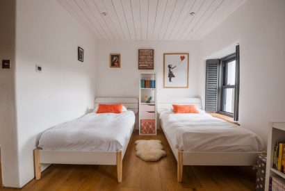 A twin bedroom at Wisteria Farmhouse, Cornwall