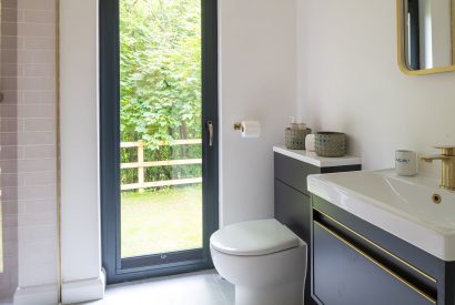 A shower room at Bracken Barn, Devon