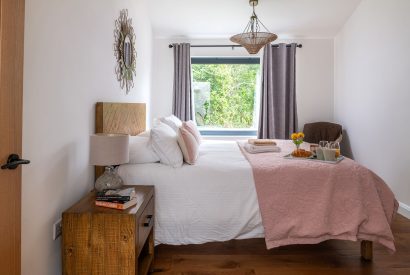 A king size bedroom at Bracken Barn, Devon