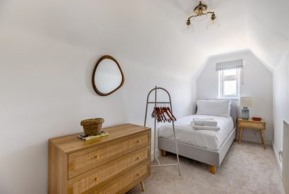 A single bedroom at Merry Manor, Essex