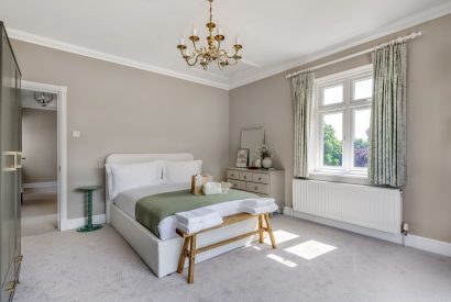 A king sized bedroom at Merry Manor, Essex