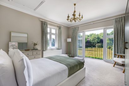 A king sized bedroom at Merry Manor, Essex