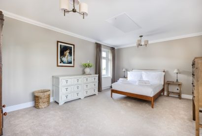 A king sized bedroom at Merry Manor, Essex