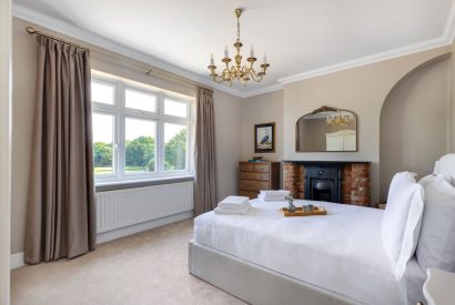 A king sized bedroom at Merry Manor, Essex
