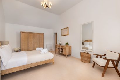 A king sized bedroom at Merry Manor, Essex