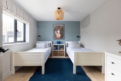 A twin bedroom at Tamarind Tide, Cornwall