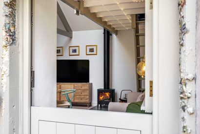 View to the log burner at The Enchanted Cottage, Cornwall