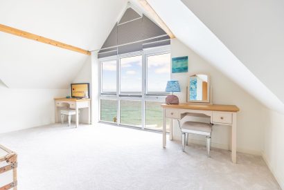 A super king sized bedroom at Tides Edge, Cornwall