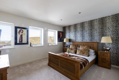 A super king sized bedroom at Tides Edge, Cornwall