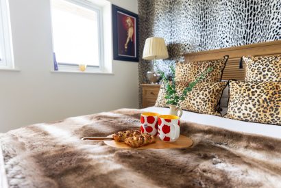 A super king sized bedroom at Tides Edge, Cornwall