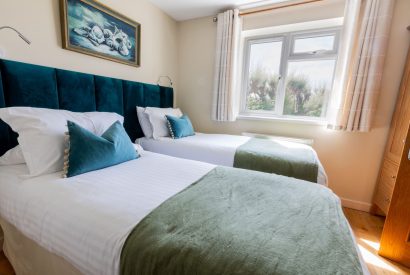 A twin bedroom at Sunset Sands, Cornwall