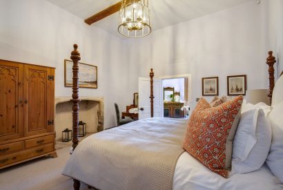 A super king-size bedroom at Priory East Gate, Essex