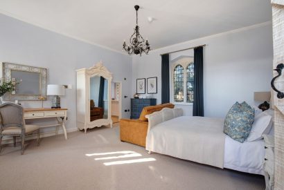 A super king-size bedroom at Priory East Gate, Essex