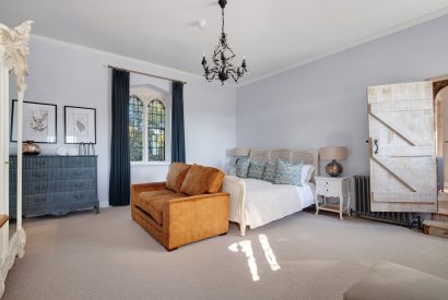 A super king-size bedroom at Priory East Gate, Essex