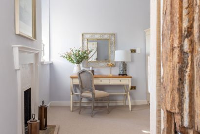 A king-size bedroom at The Priory Gatehouses, Essex 