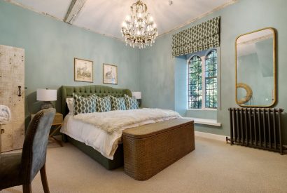 A king-size bedroom at The Priory Gatehouses, Essex 