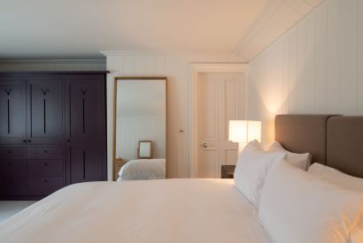 A super king size bedroom at Muirfield Green, East Lothian