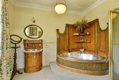 A corner bath at Chulmleigh Manor, Devon