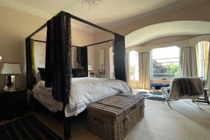 A four poster bedroom at Chulmleigh Manor, Devon