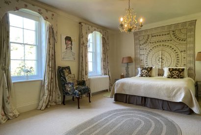 A king size bedroom at Chulmleigh Manor, Devon