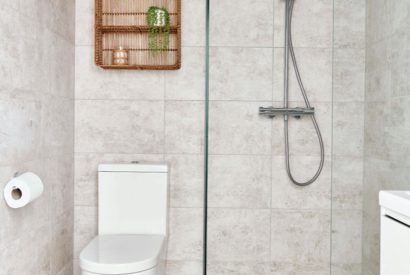 A shower room at Driftwood House, Dorset