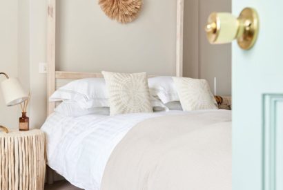 A king size bedroom at Driftwood House, Dorset