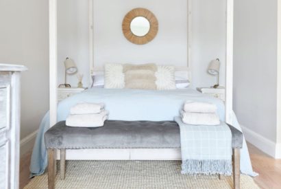 A king size bedroom at Driftwood House, Dorset
