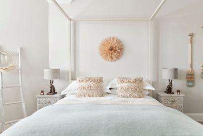 A king size bedroom at Driftwood House, Dorset