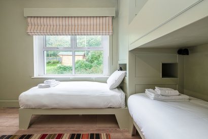 A bunk bedroom at Plas Glan Menai, Anglesey