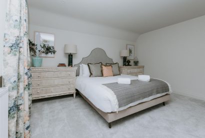 A king size bedroom at Havenwood, Oxfordshire