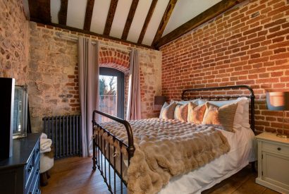 The king-size bedroom at Priory Barn, Essex