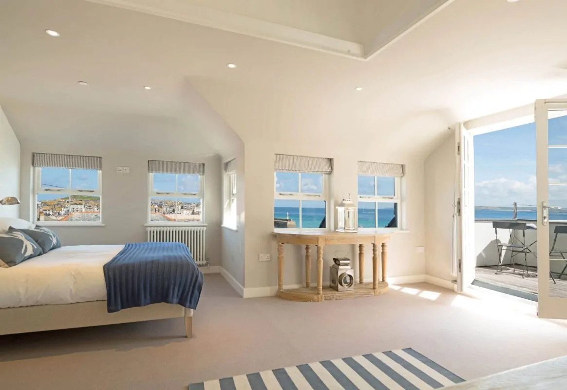 Bedroom with sea view at Harbourview House, Cornwall