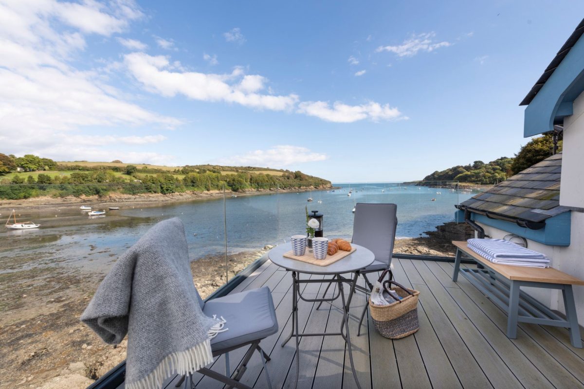 Outdoor dining overlooking the sea at Sea Island, Cornwall