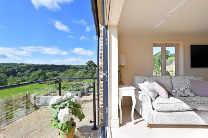 The living room and view from Horseshoe House, Peak District