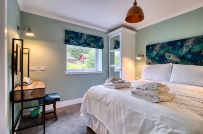 A double bedroom at Pine Cabin, Loch Lomond
