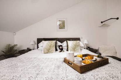 Breakfast tray in bed at Luxury Penthouse, Cotswolds