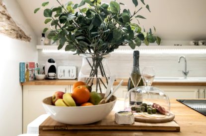 Flowers on the kitchen counter at Luxury Penthouse, Cotswolds