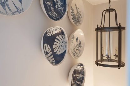 Wall decor and hanging lights at Beatrix Cottage, Lake District