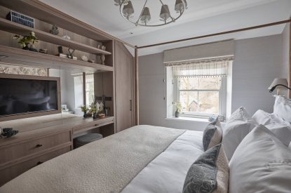The bedroom with dressing table at Beatrix Cottage, Lake District