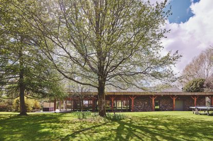 The garden and exterior of the spa facilities at Shepherd's View, Lake District