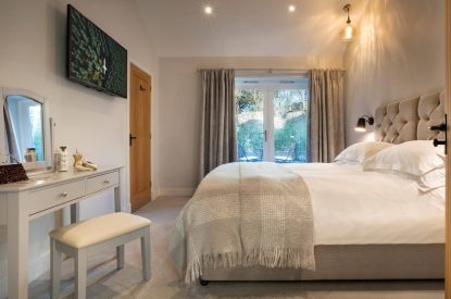 A bedroom with balcony at Kirkstone, Lake District