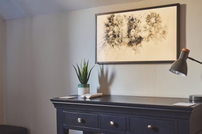 A bedroom side table at Ember Cottage, Cotswolds