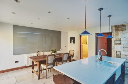 The open plan kitchen and dining area at Ember Cottage, Cotswolds