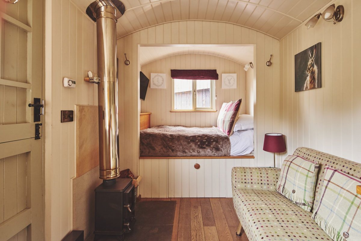 The living area and bedroom at Eagles Hut, Peak District