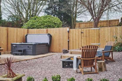 The garden and hot tub at Hidden Orchard, Cheshire