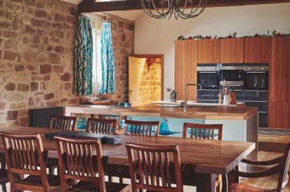 The kitchen and dining area at Woodpecker Loft, Peak District