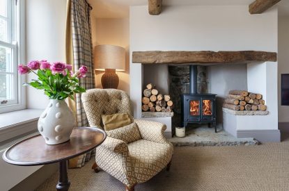 The living room with a log burner at Pen y Bryn, Abersoch