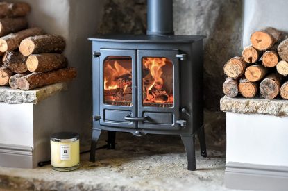 The living room with a log burner at Pen y Bryn, Abersoch