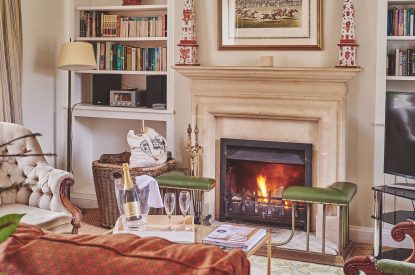 The living room with log burner at Wordsworth Cottage, Cotswolds